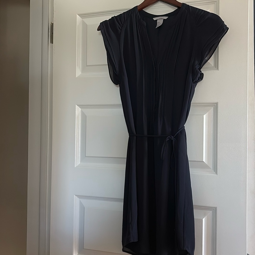 H & M Navy dress size 6. The cut is so flattering!
